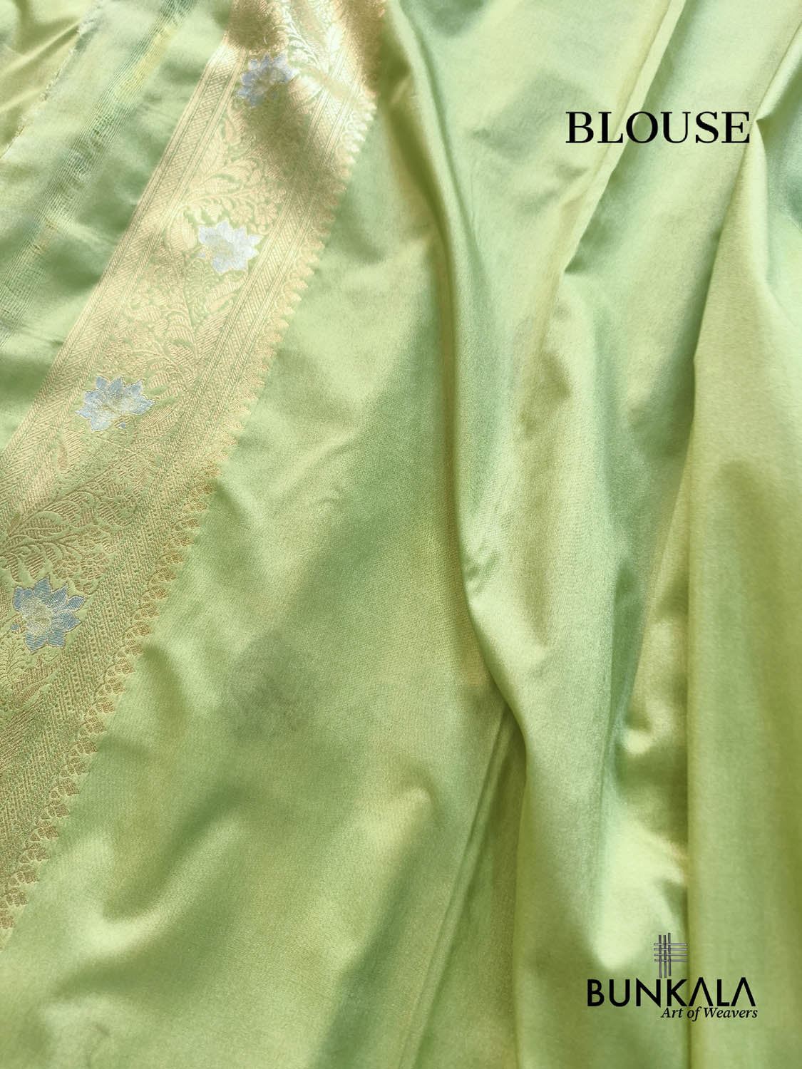 Pista Green Floral Meenakari Stripe Weaved Banarasi Silk Saree