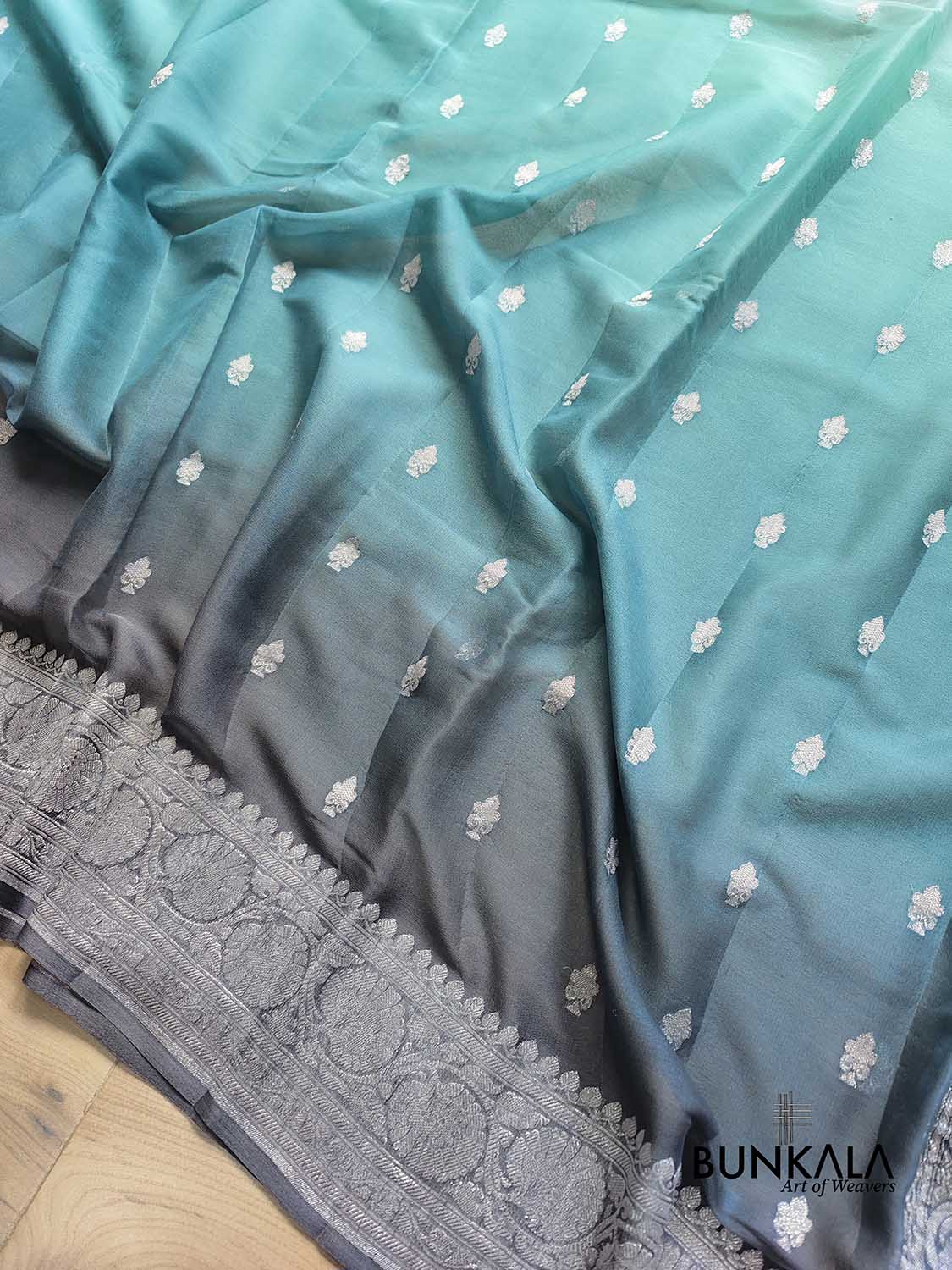 Turquoise Blue and Grey Shaded Pure Khaddi Chiffon Allover Silver Zari Buti Banarasi Saree