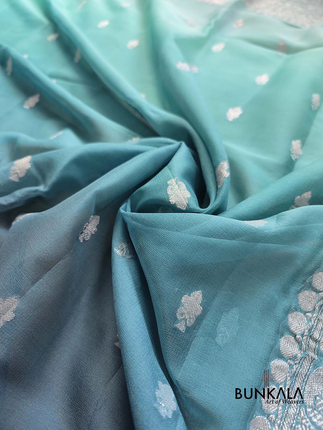 Turquoise Blue and Grey Shaded Pure Khaddi Chiffon Allover Silver Zari Buti Banarasi Saree