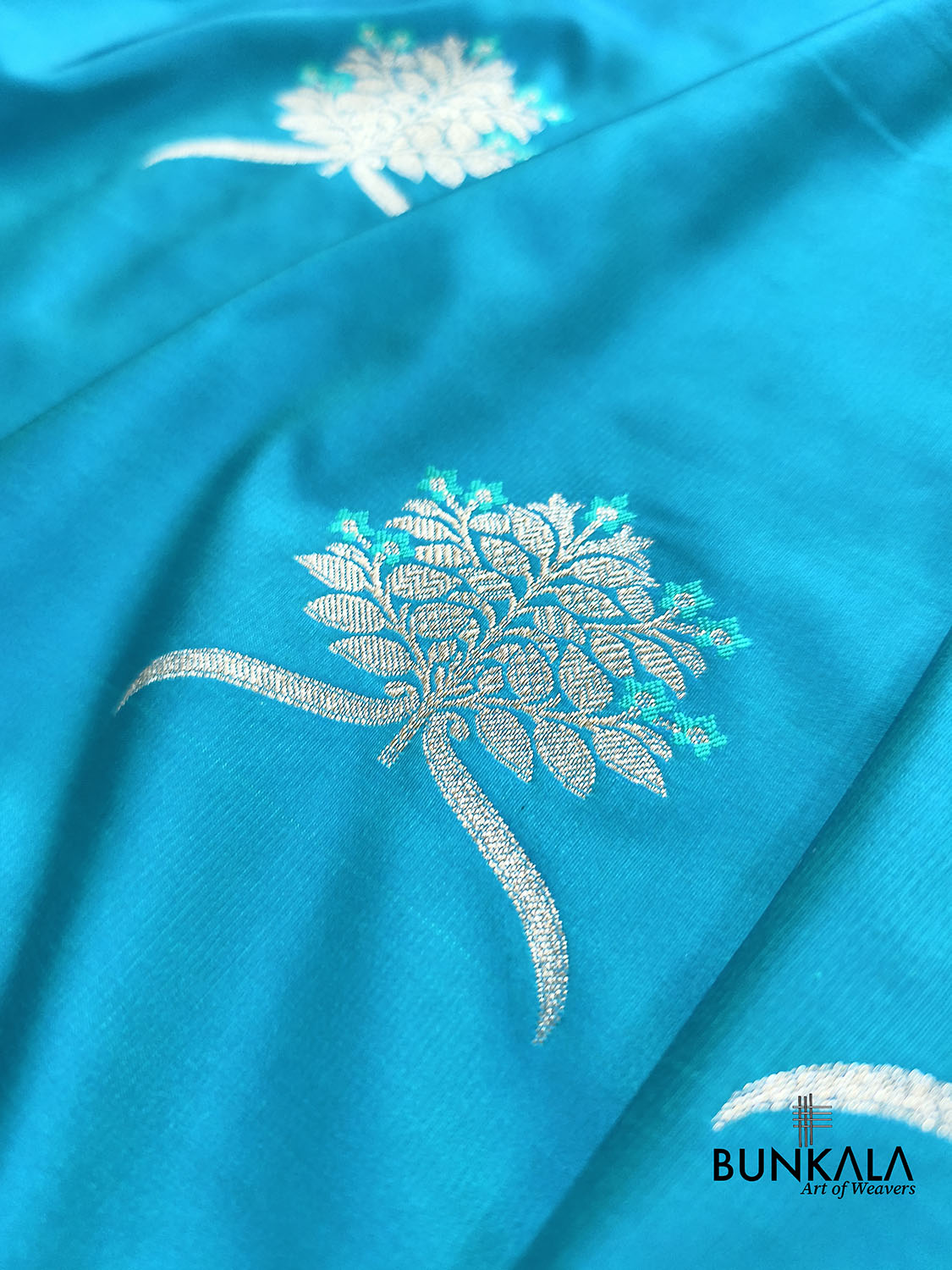 Ocean Blue Leaf Buta Weaved Banarasi Mashru Silk Saree