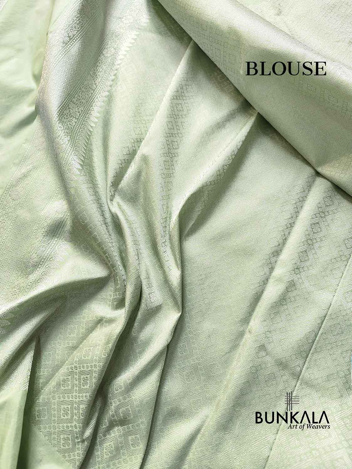 Pastel English Pista Green Double Tana Gold and Silver Zari Allover Small Buti Handloom Pure Katan Silk Banarasi Saree with Silver Zari Border