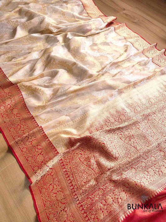 Off White Ektara Grace Pure Tissue Silk Kadwa Handwoven Sona Rupa Banarasi Saree with Red Contrast Border and Pallu