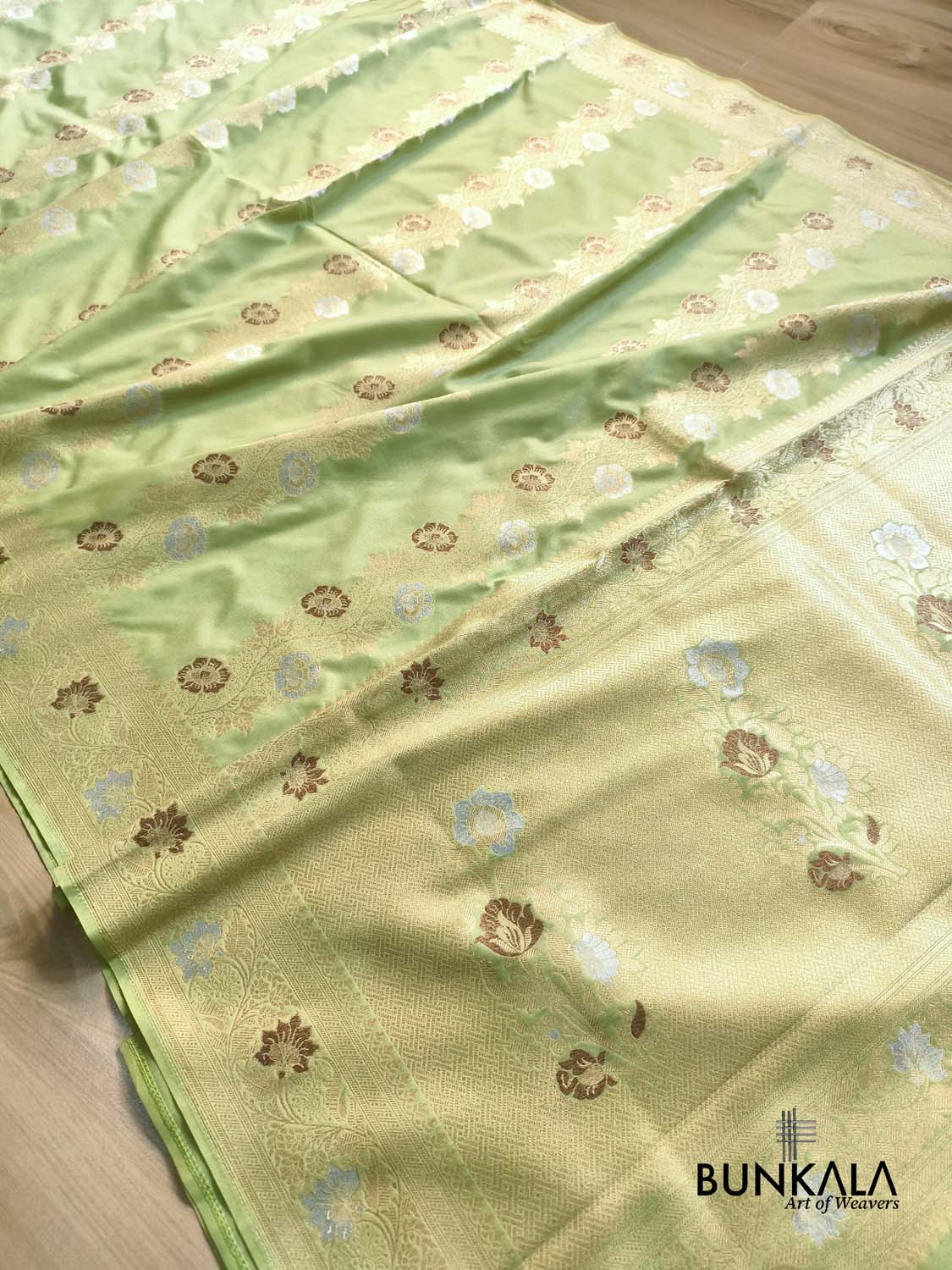 Pista Green Floral Meenakari Stripe Weaved Banarasi Silk Saree