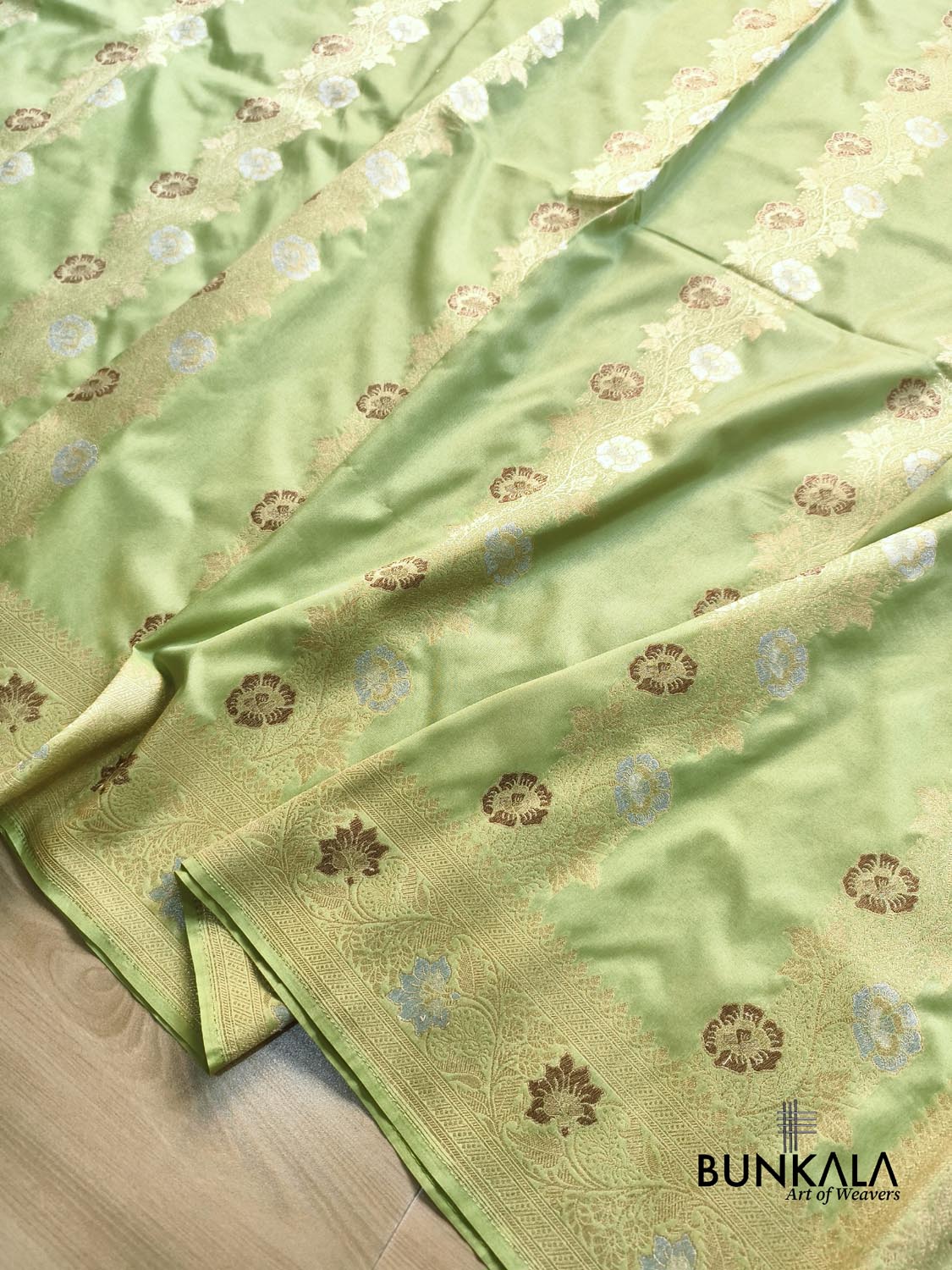Pista Green Floral Meenakari Stripe Weaved Banarasi Silk Saree
