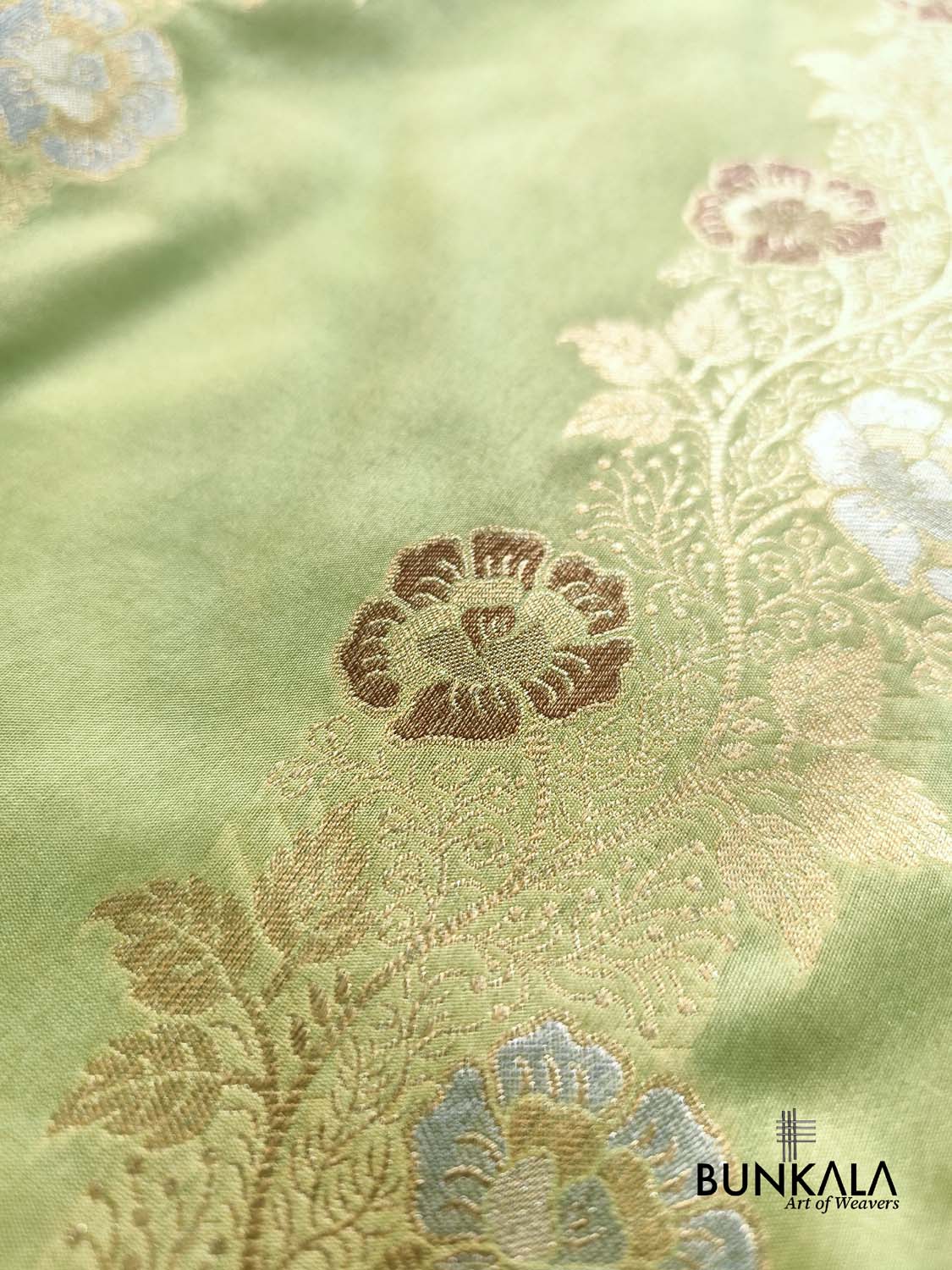 Pista Green Floral Meenakari Stripe Weaved Banarasi Silk Saree