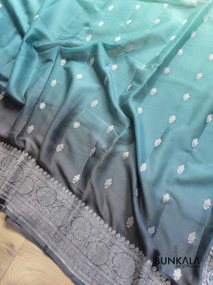 Turquoise Blue and Grey Shaded Pure Khaddi Chiffon Allover Silver Zari Buti Banarasi Saree