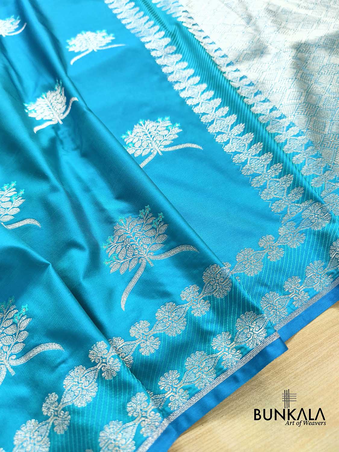 Ocean Blue Leaf Buta Weaved Banarasi Mashru Silk Saree