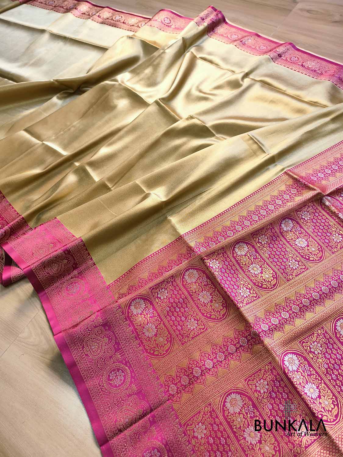 Golden & Pink Plain Contrast Border Weaved Banarasi Tissue Silk Saree