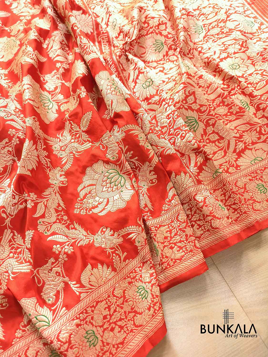 Orange Heritage Figure Motif Banarasi Pure Katan Silk Saree