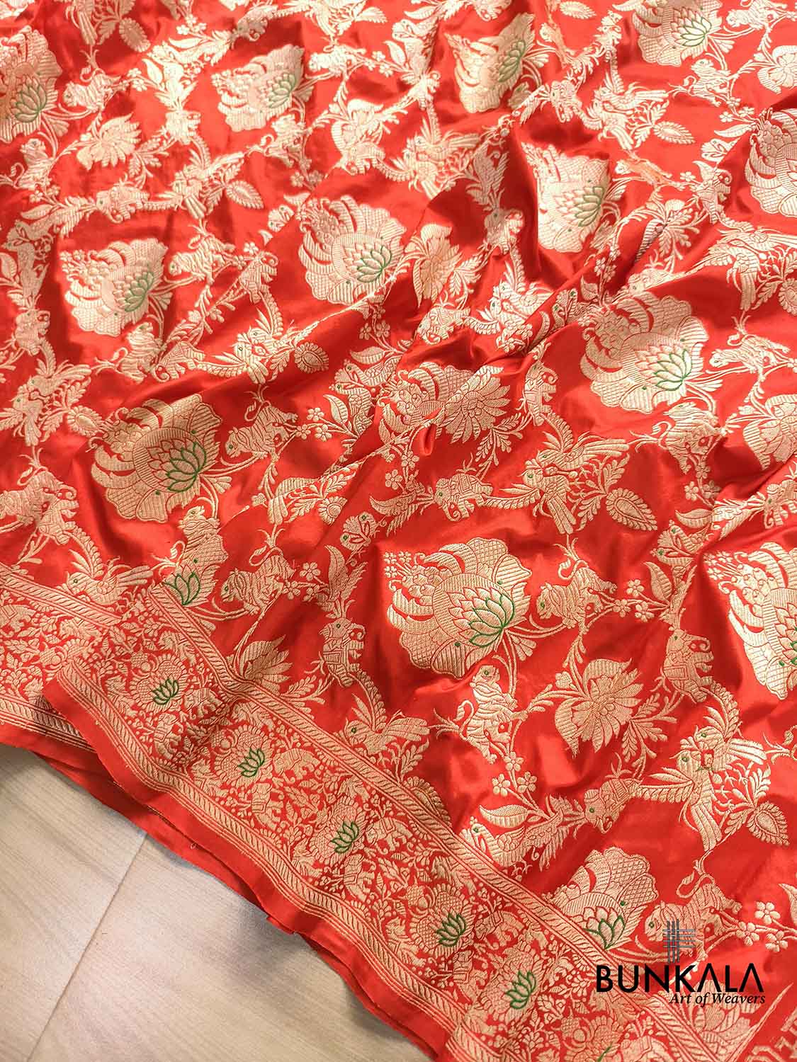 Orange Heritage Figure Motif Banarasi Pure Katan Silk Saree
