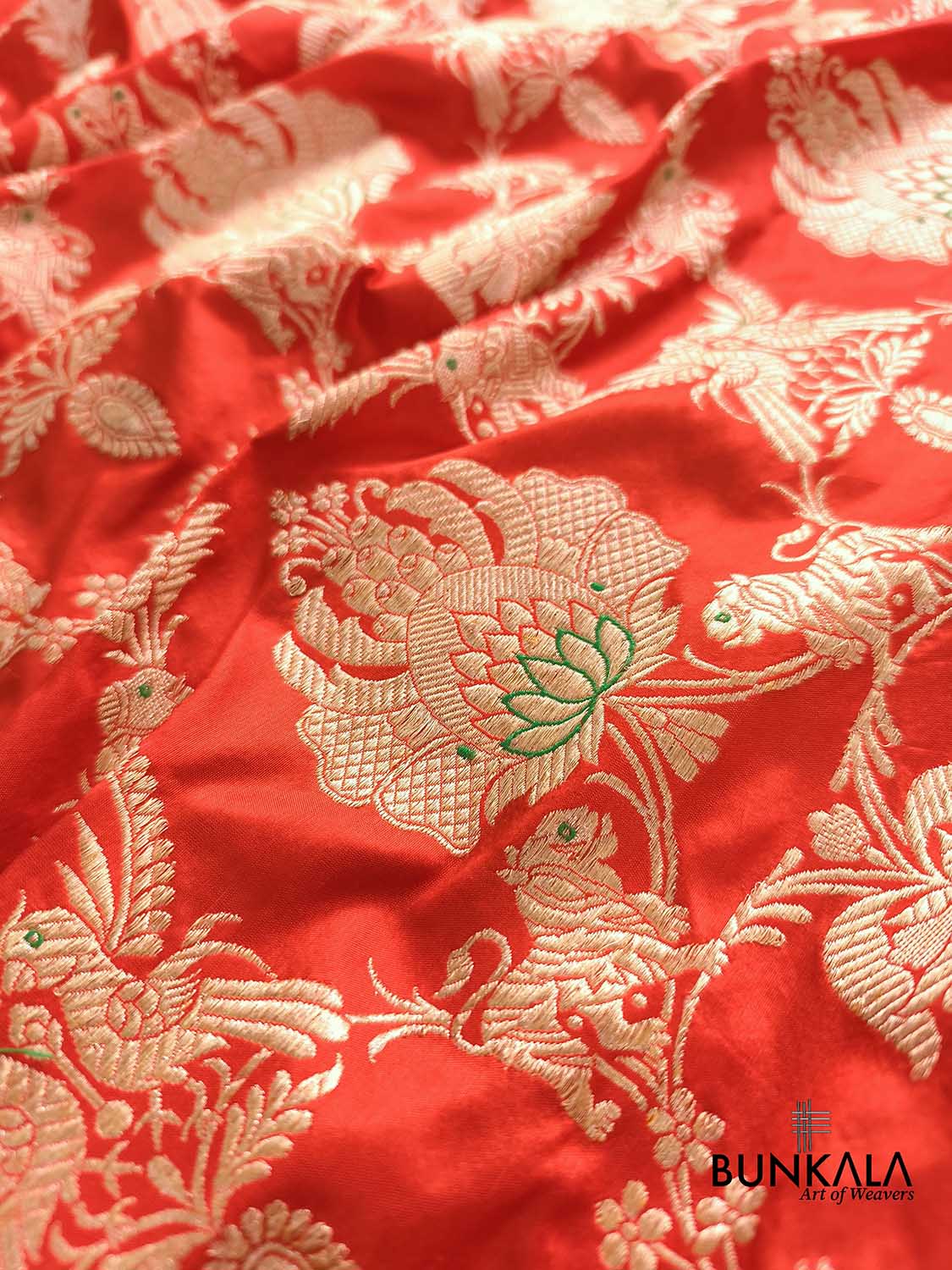Orange Heritage Figure Motif Banarasi Pure Katan Silk Saree