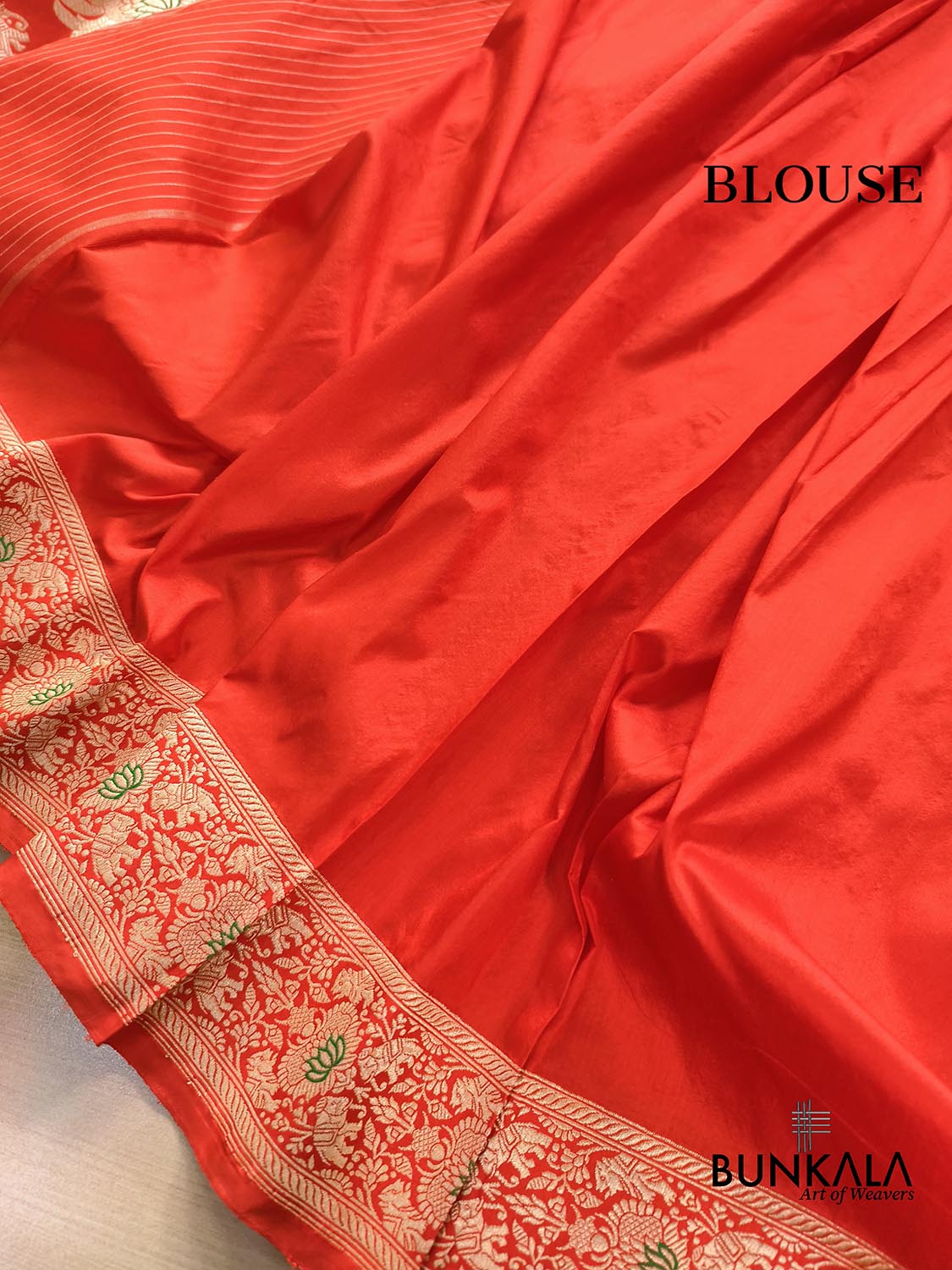 Orange Heritage Figure Motif Banarasi Pure Katan Silk Saree