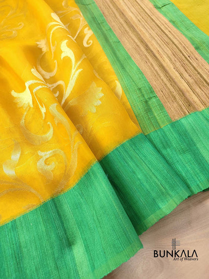 Yellow Floral Jaal Handloom Banarasi Organza Saree with Raw Silk Border