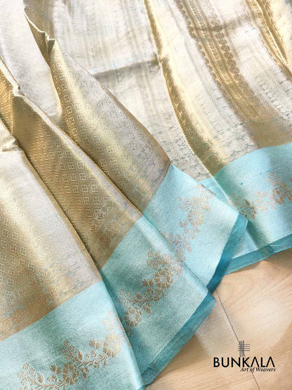 Golden Brocade Handloom Banarasi Pure Tissue Saree with Contrast Bright Sky Blue Katan Silk Floral Border