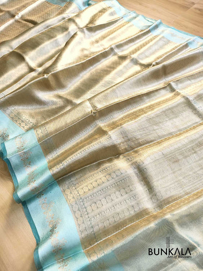 Golden Brocade Handloom Banarasi Pure Tissue Saree with Contrast Bright Sky Blue Katan Silk Floral Border