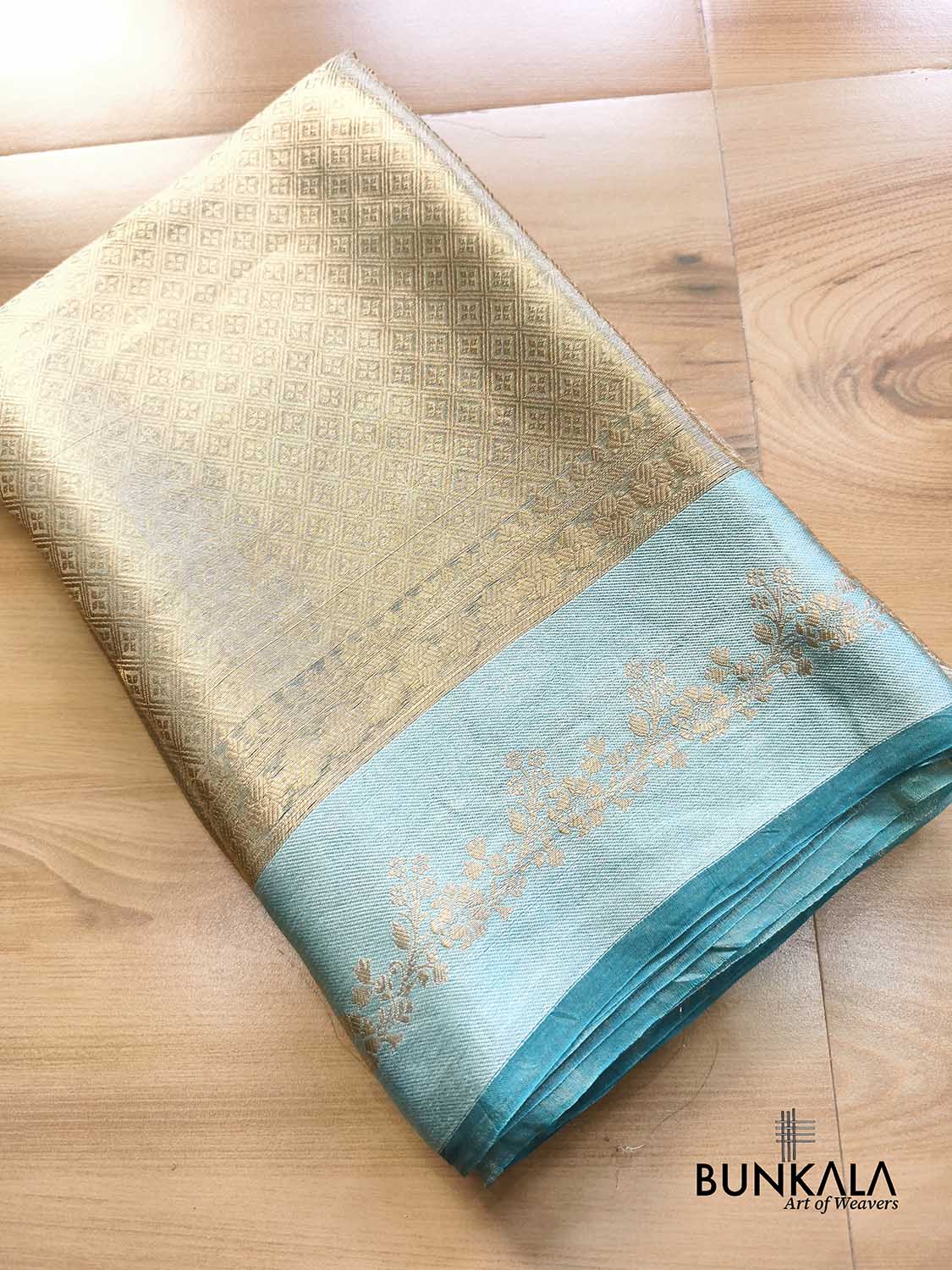 Golden Brocade Handloom Banarasi Pure Tissue Saree with Contrast Bright Sky Blue Katan Silk Floral Border