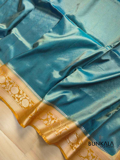Peacock Blue Plain Soft Tissue Silk Saree with Yellow Floral Design Contrast Border