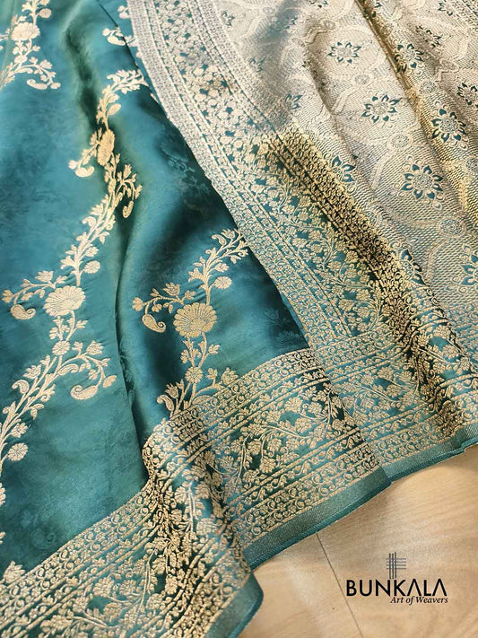 Bottle Green Floral Leheriya Vines Weaved Heavy Pallu Banarasi Mashru Silk Saree