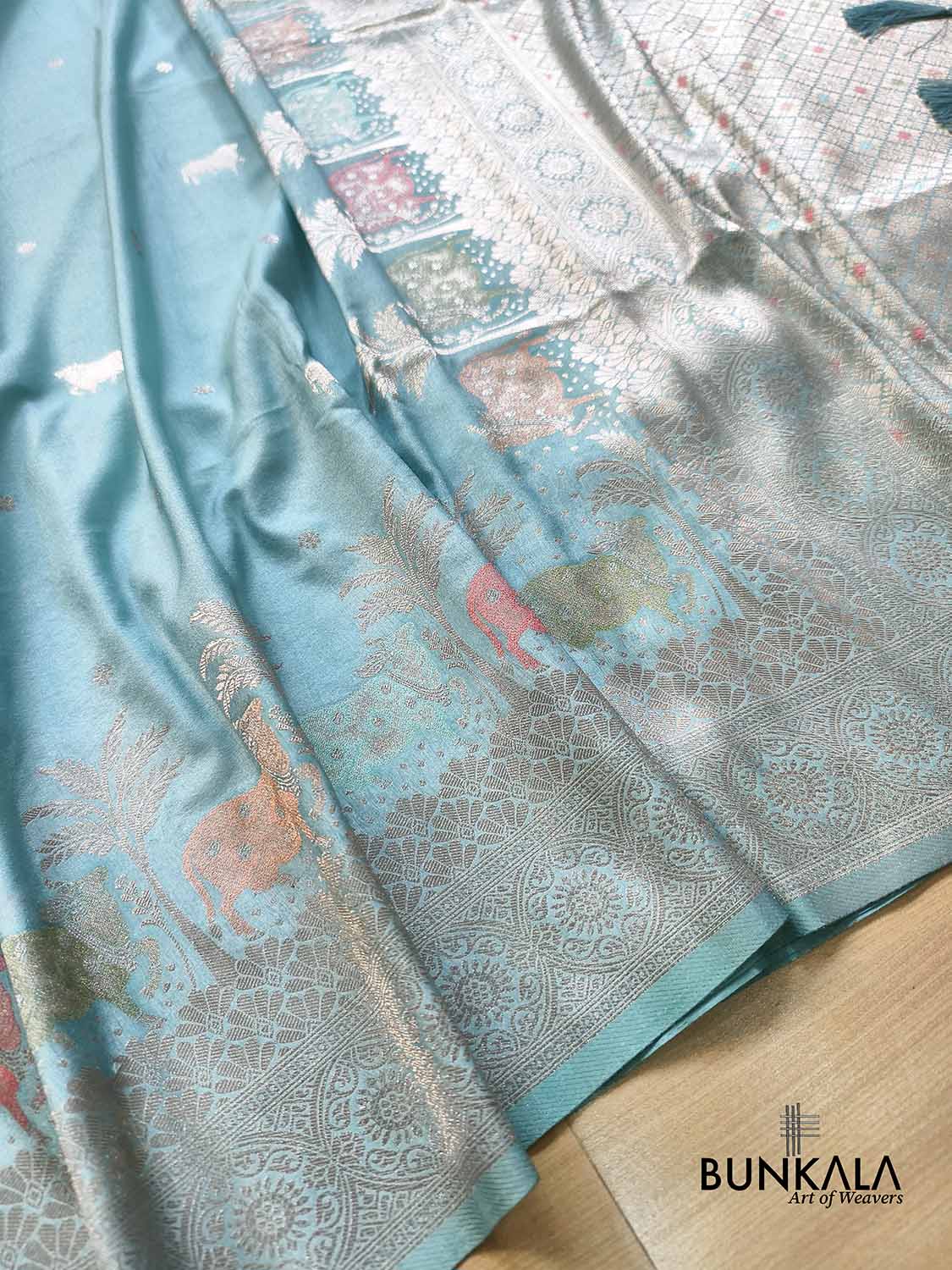 Light Sky Blue Cow & Tree Motif Weaved Banarasi Resham Silk Saree