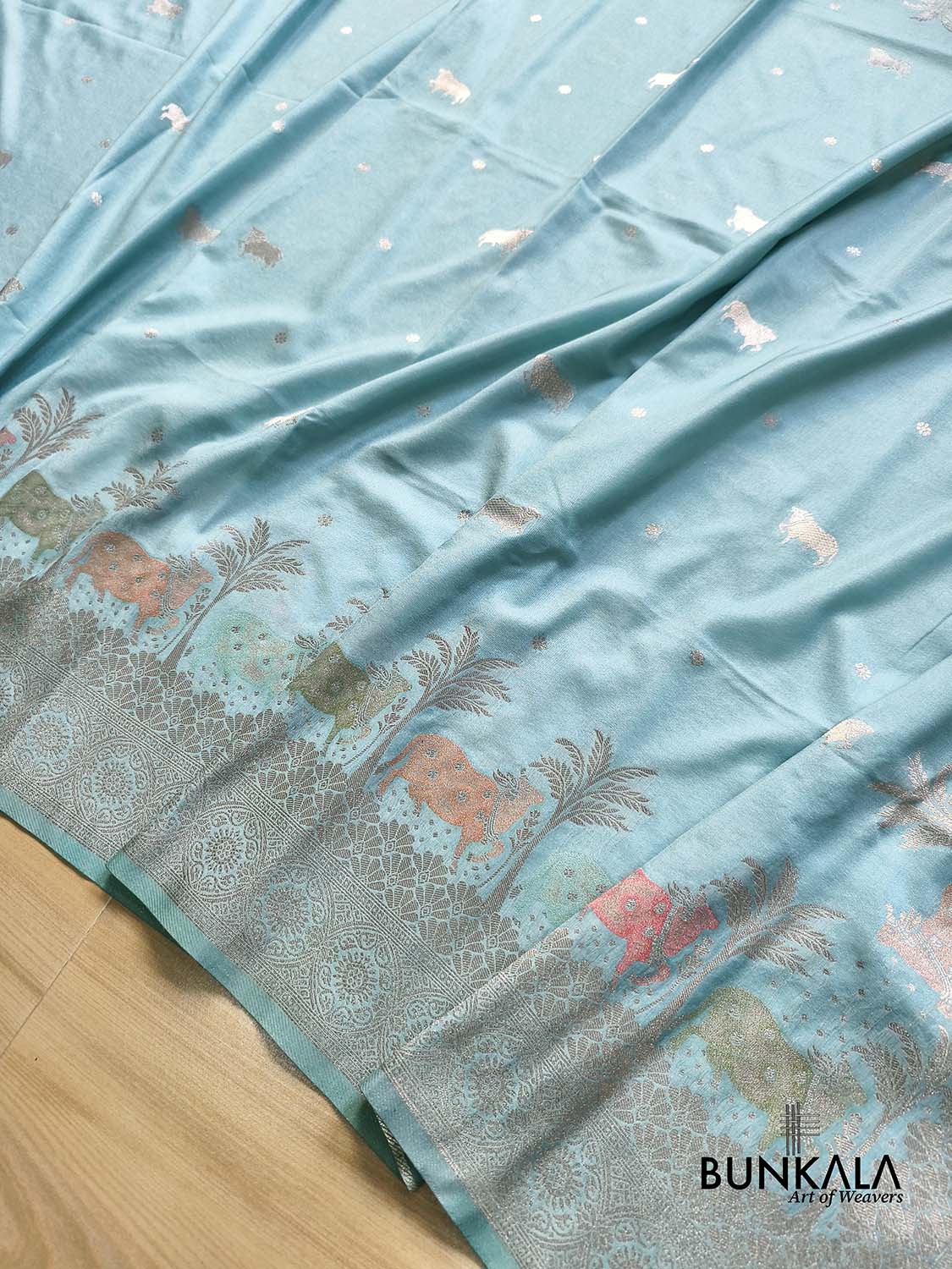 Light Sky Blue Cow & Tree Motif Weaved Banarasi Resham Silk Saree