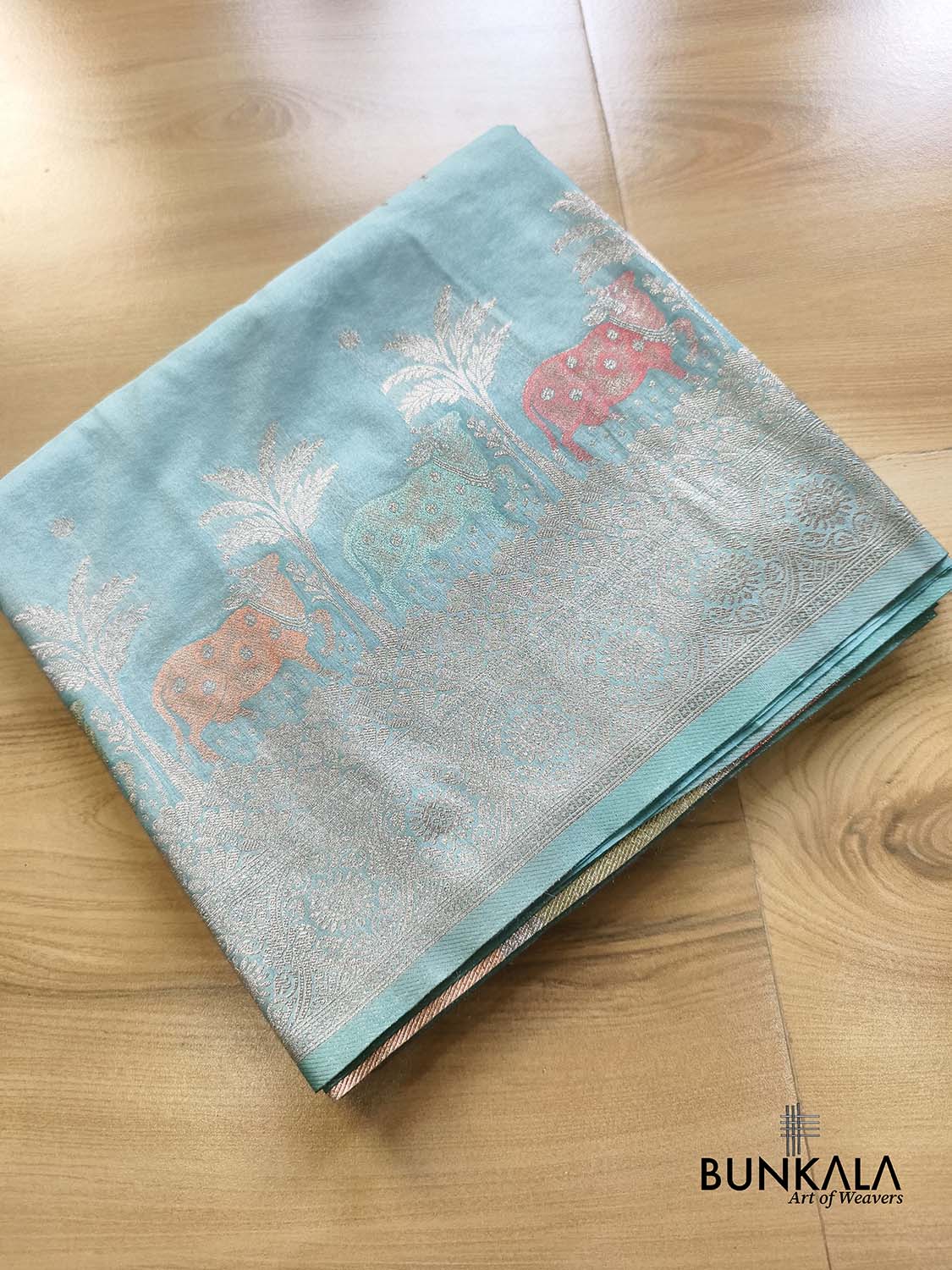 Light Sky Blue Cow & Tree Motif Weaved Banarasi Resham Silk Saree