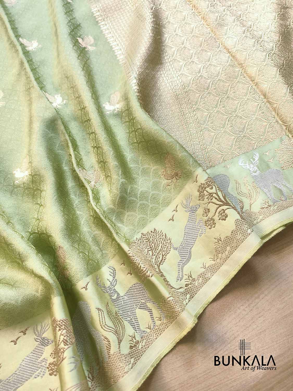 Pista Green Birds Motif Brocade Tanchui Banarasi Mashru Silk Saree Deer Border