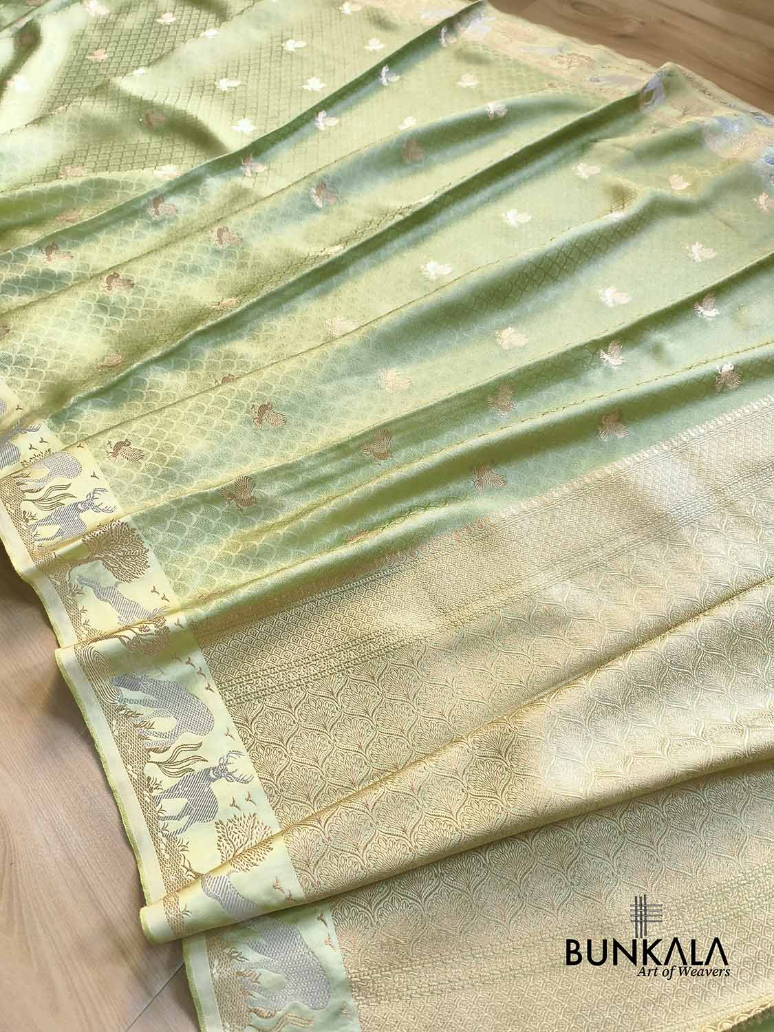 Pista Green Birds Motif Brocade Tanchui Banarasi Mashru Silk Saree Deer Border
