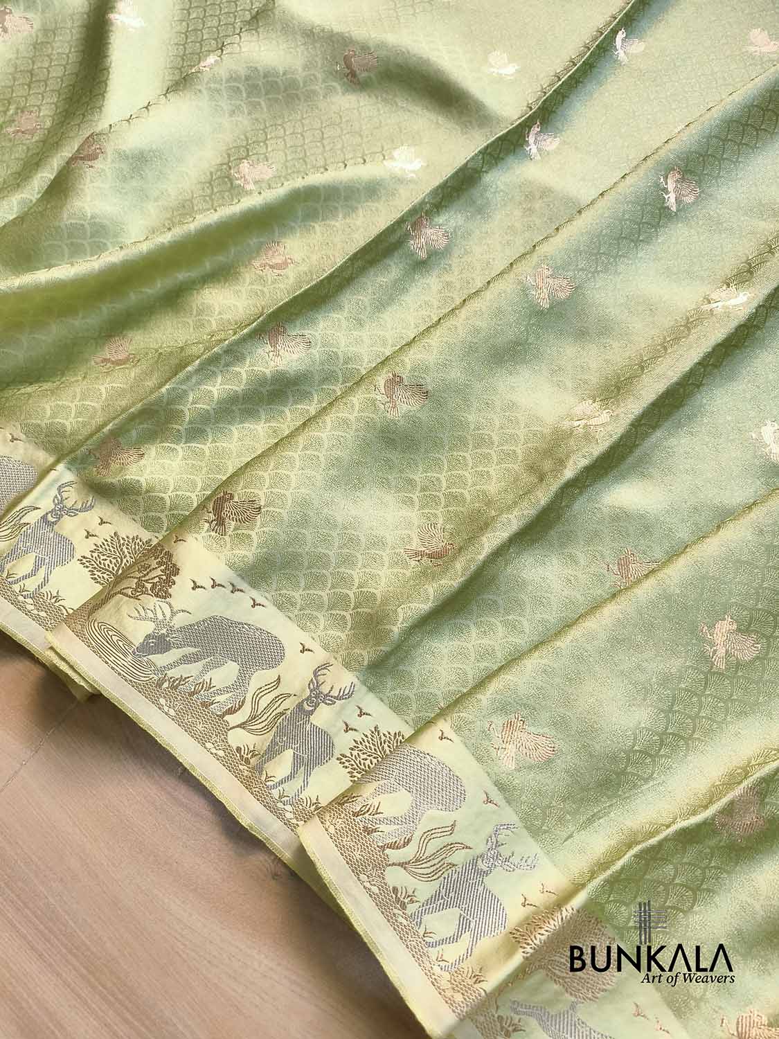 Pista Green Birds Motif Brocade Tanchui Banarasi Mashru Silk Saree Deer Border