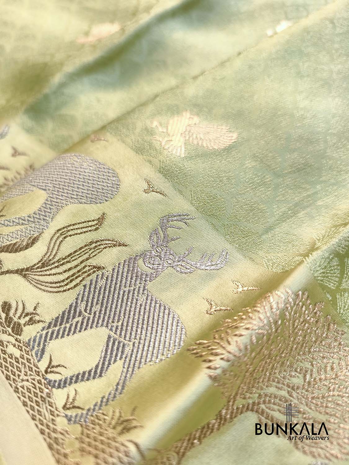 Pista Green Birds Motif Brocade Tanchui Banarasi Mashru Silk Saree Deer Border