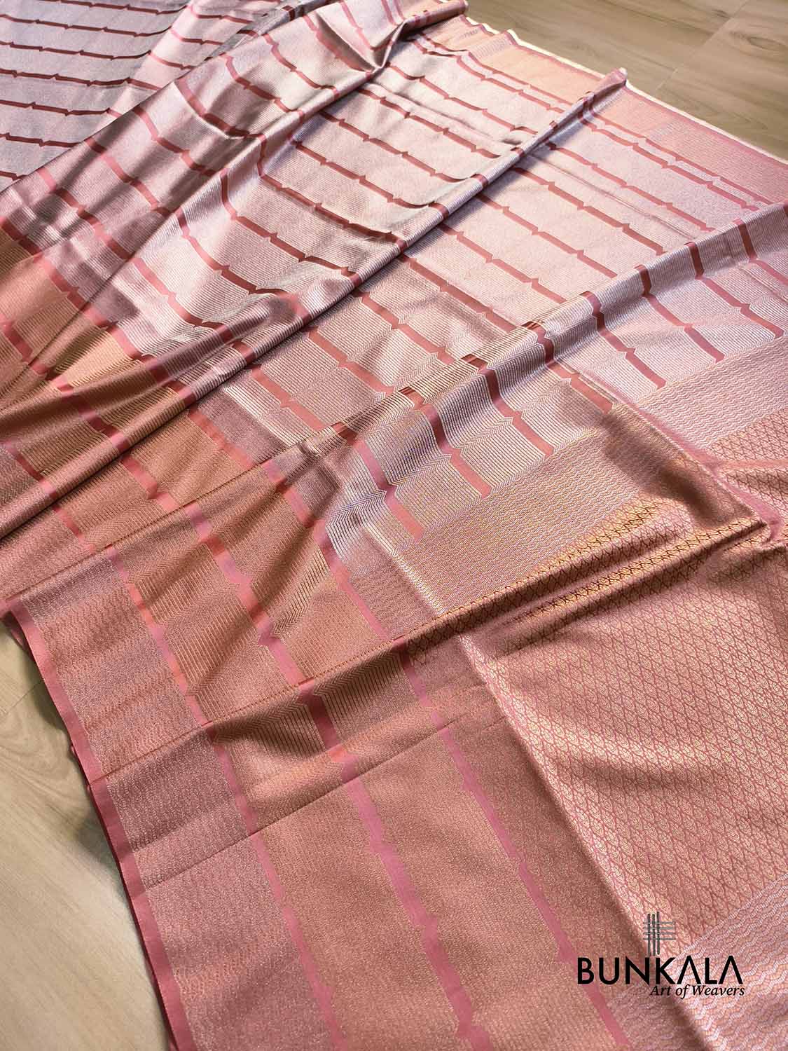 Champion Pink Geometrical Stripe Pattern Weaved Banarasi Mashru Silk Saree