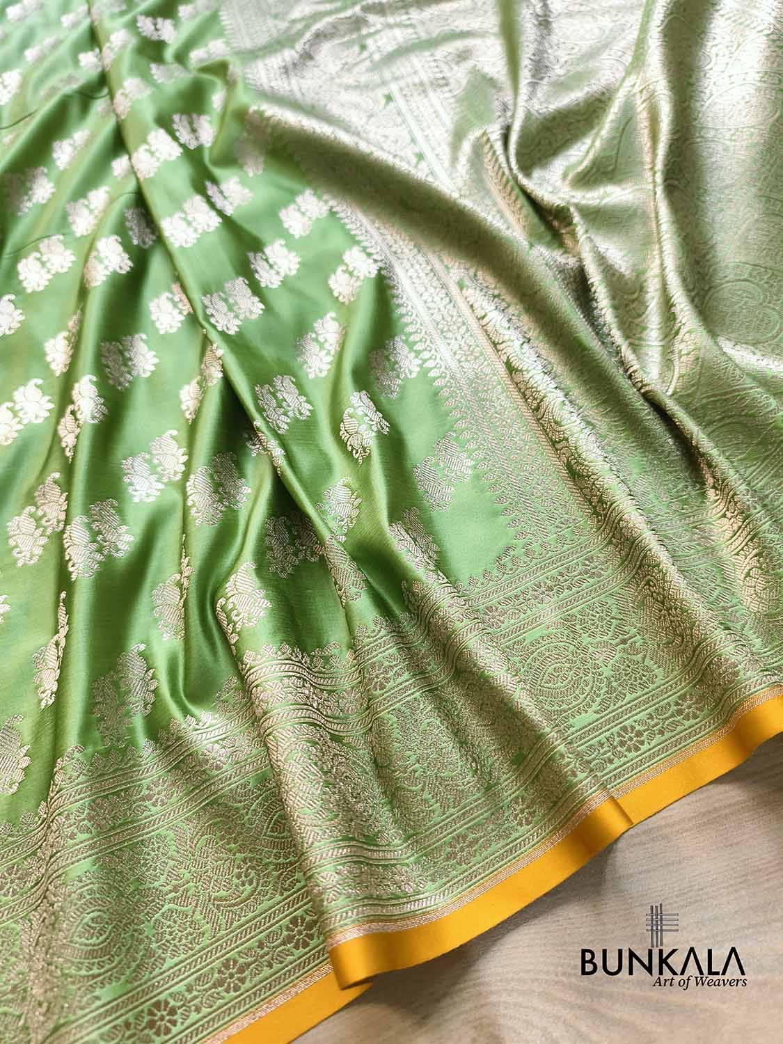Pastel Green Traditional Buti Weaved Banarasi Mashru Silk Saree
