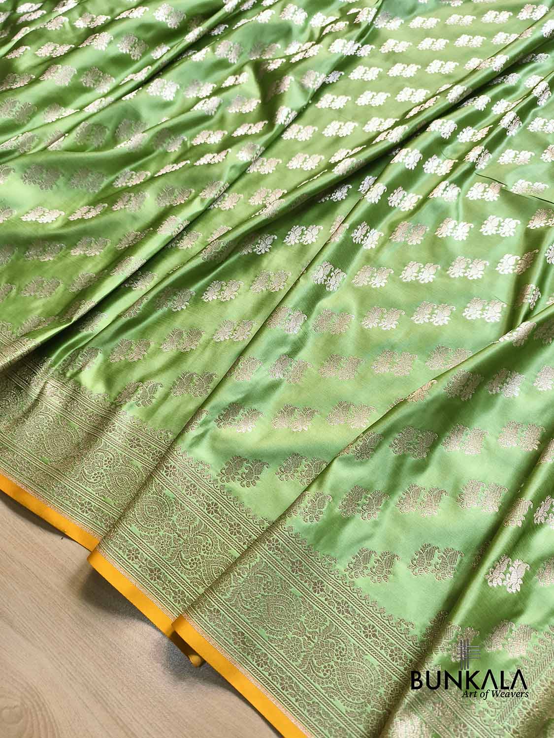 Pastel Green Traditional Buti Weaved Banarasi Mashru Silk Saree
