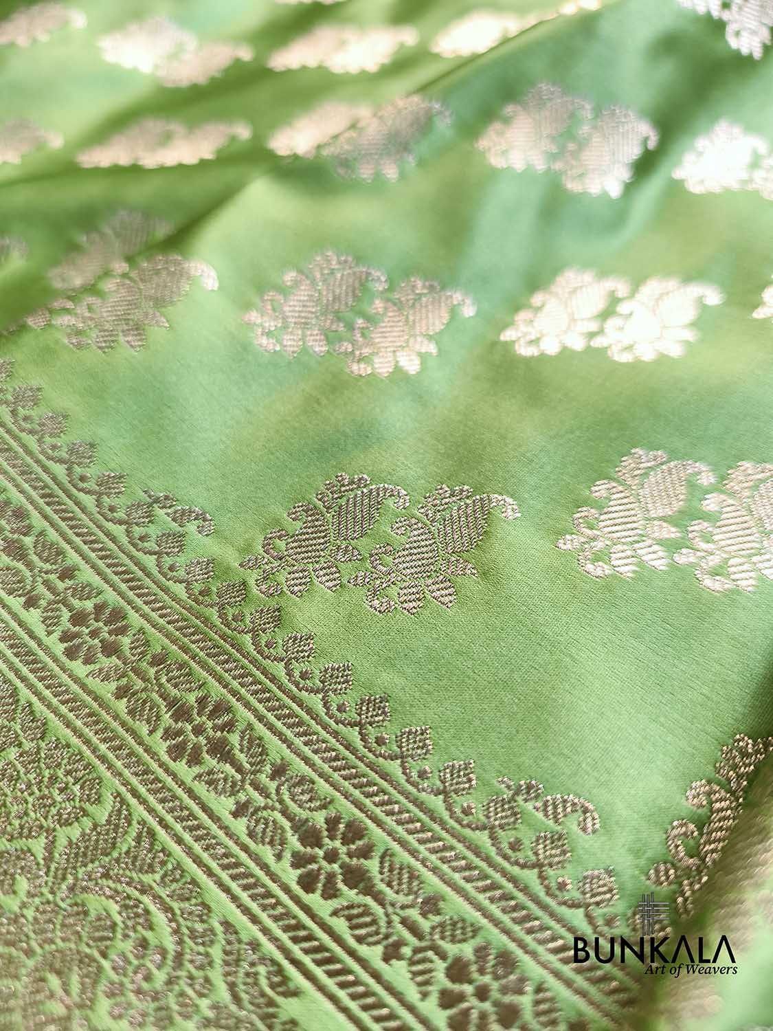 Pastel Green Traditional Buti Weaved Banarasi Mashru Silk Saree