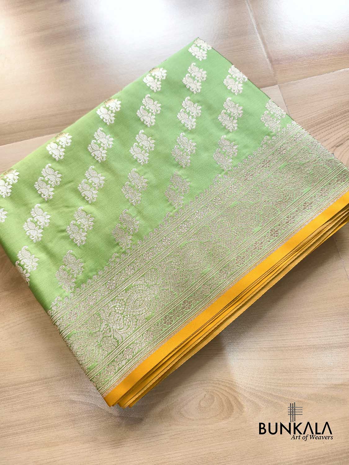 Pastel Green Traditional Buti Weaved Banarasi Mashru Silk Saree