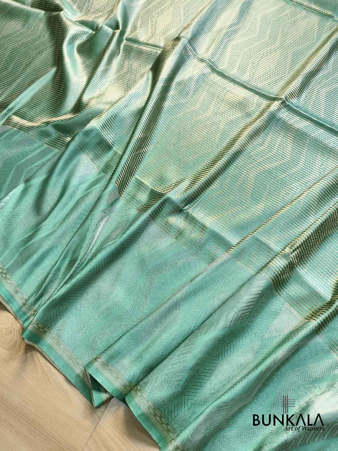 Sea Green Geometrical Zig Zag Pattern Weaved Banarasi Mashru Silk Saree