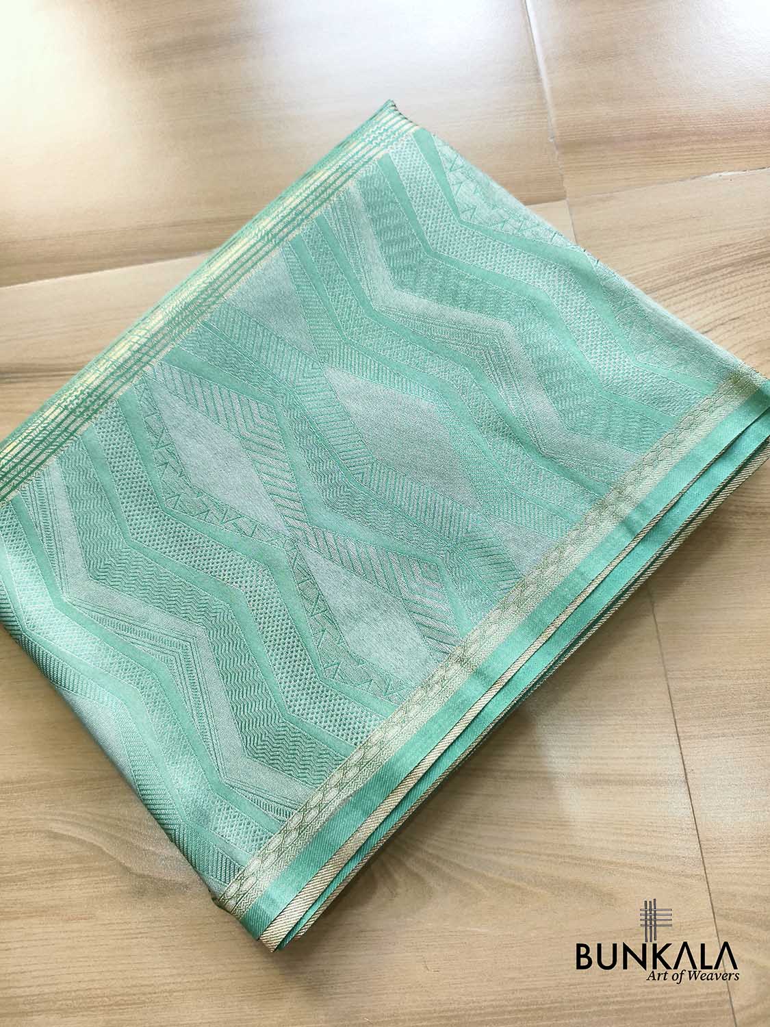 Sea Green Geometrical Zig Zag Pattern Weaved Banarasi Mashru Silk Saree