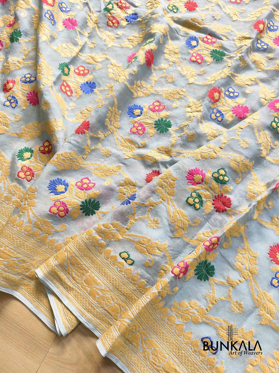 Powder Blue Multi Meenakari Floral Jaal Handloom Banarasi Pure Georgette Saree