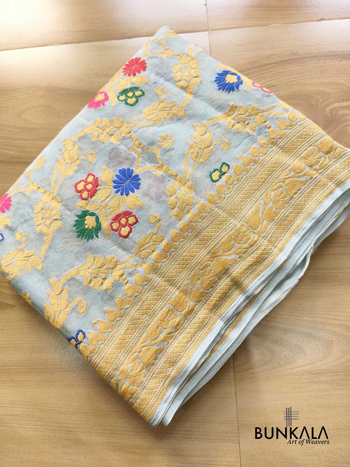 Powder Blue Multi Meenakari Floral Jaal Handloom Banarasi Pure Georgette Saree