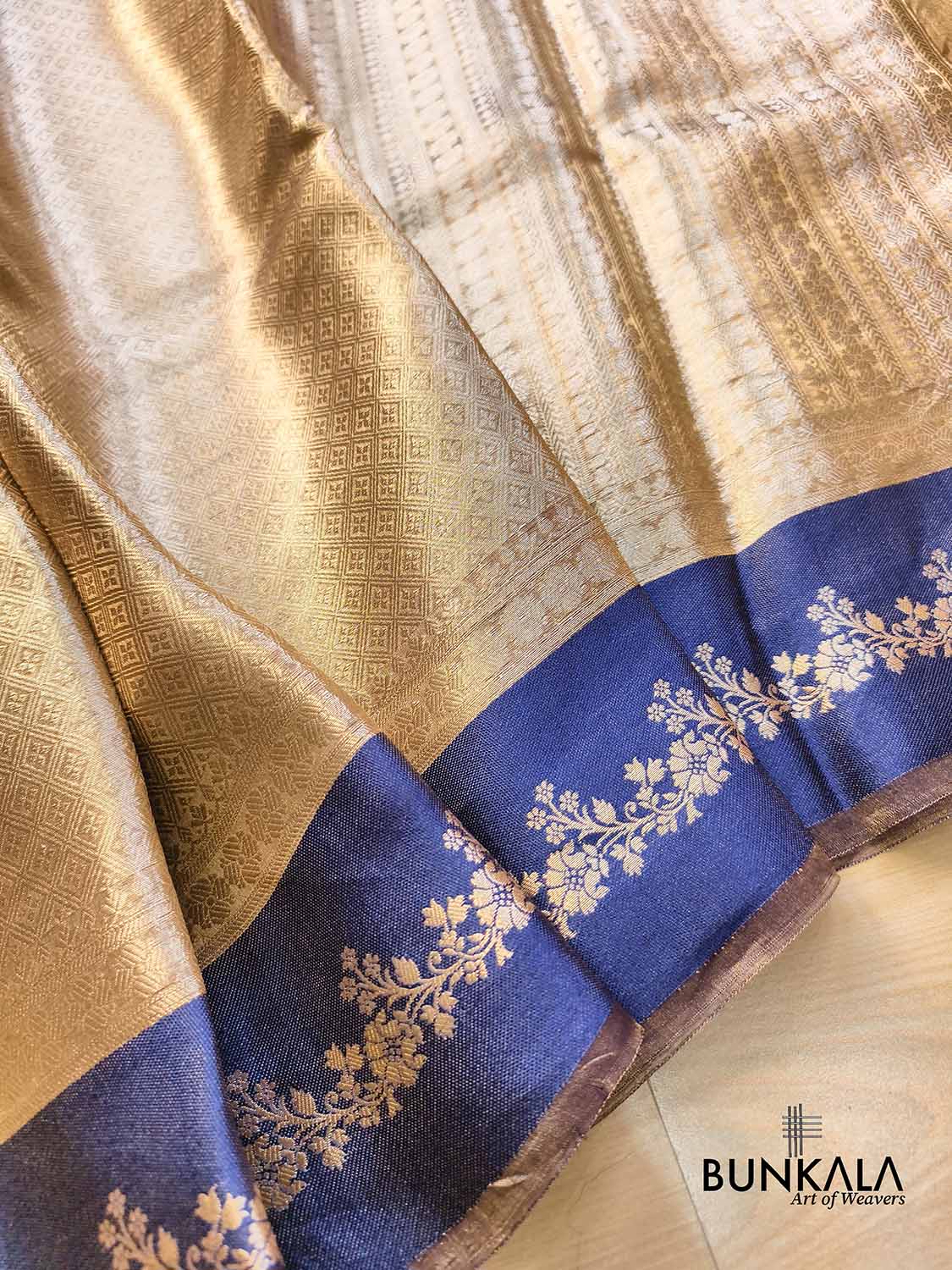 Golden Brocade Handloom Banarasi Pure Tissue Saree with Contrast Royal Blue Katan Silk Floral Border