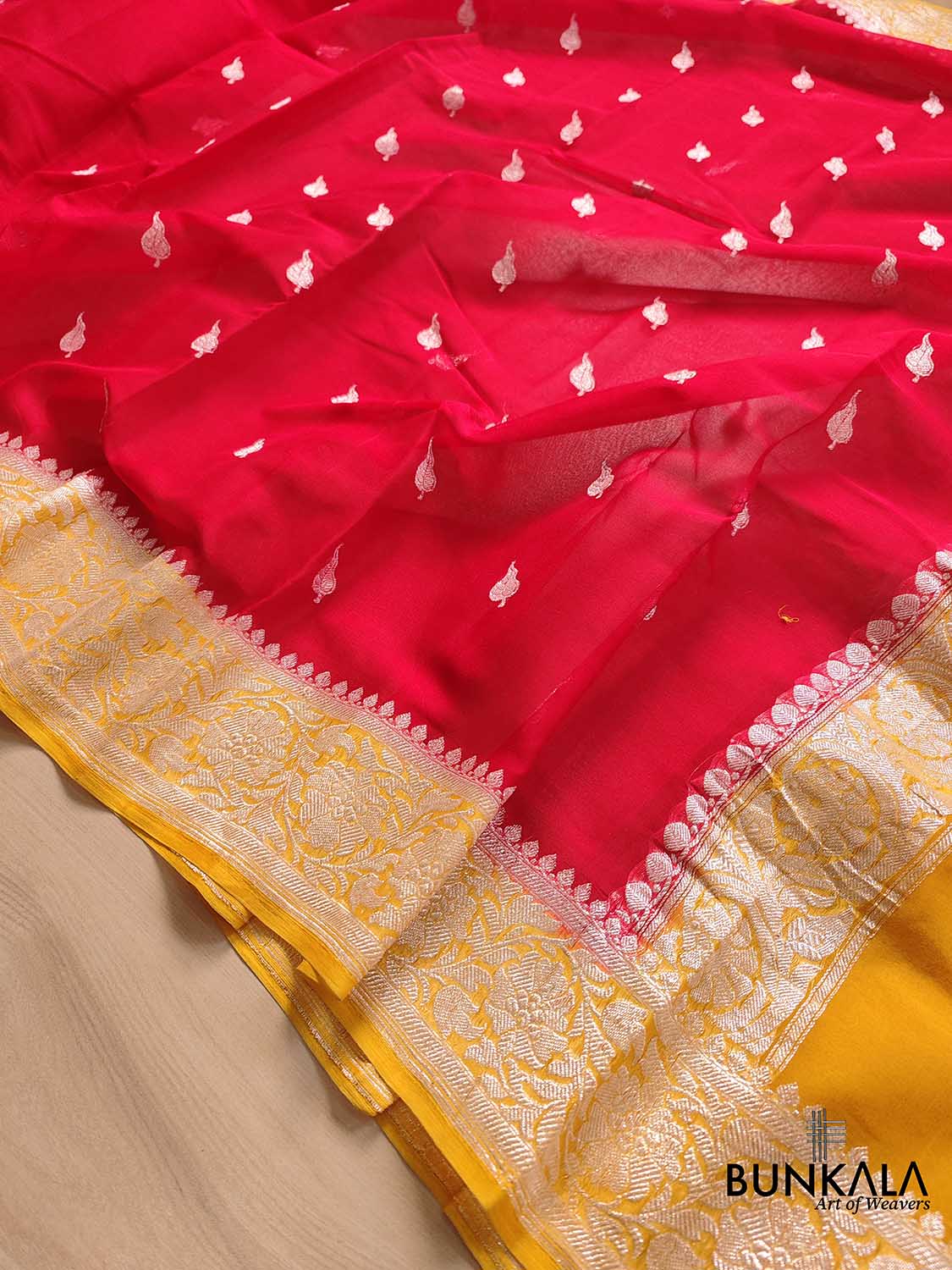 Enchanting Elegance Red Banarasi Pure Khaddi Chiffon Saree with Silver Zari Buti and Orange Contrast Border