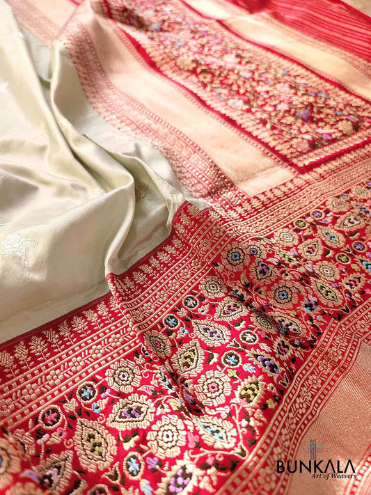 Classic Pastel Green Pure Katan Silk Handloom Allover Sona Rupa Buti Banarasi Saree with Contrast Meenakari Red Border