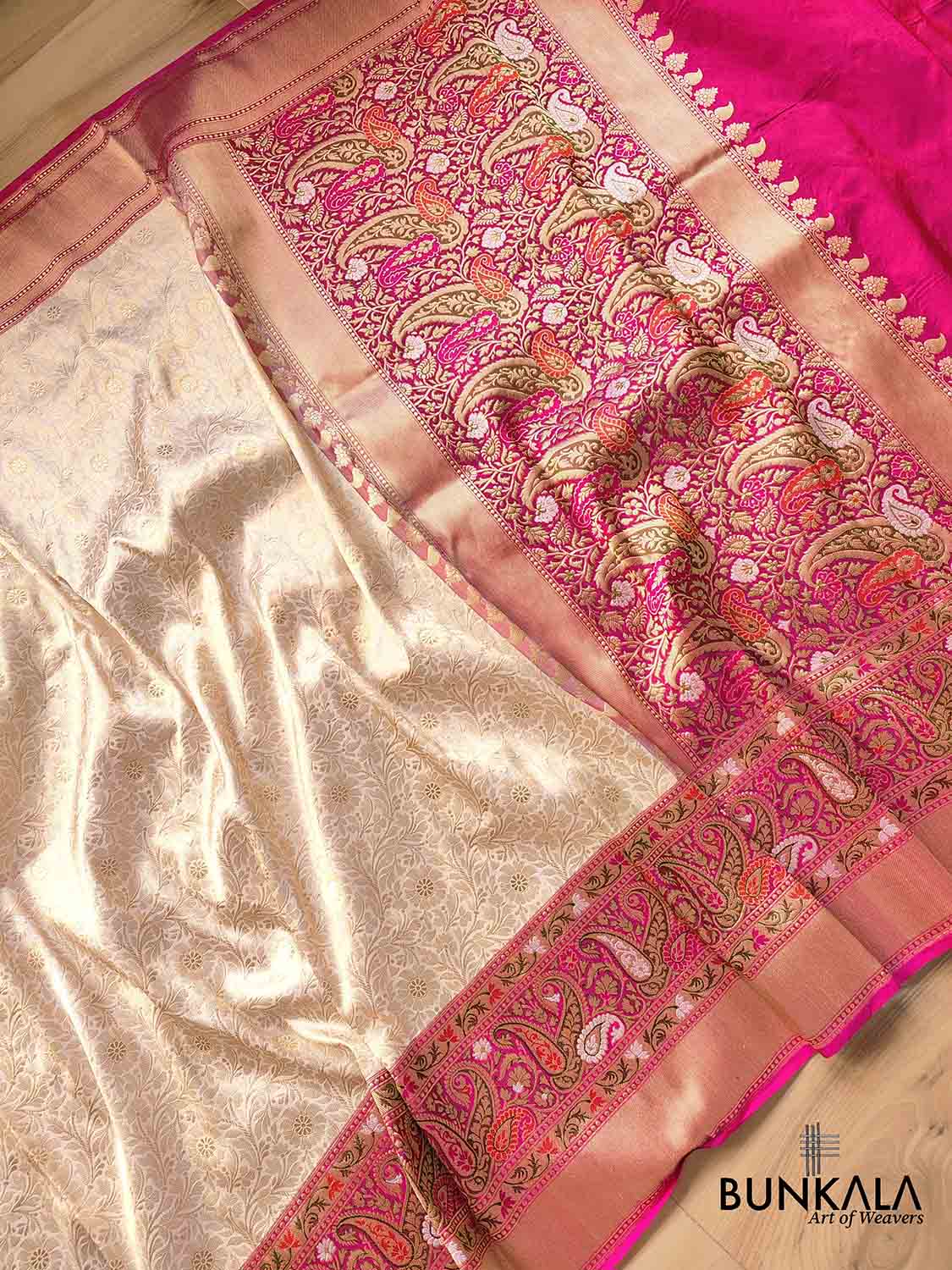 Exquisite Craftsmanship Off White Pure Katan Silk Handloom Brocade Banarasi Saree with Meenakari Border and Pallu